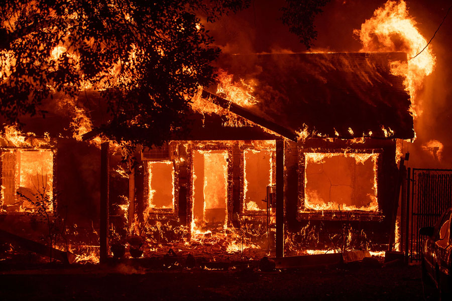 A burning house in Paradise, California.